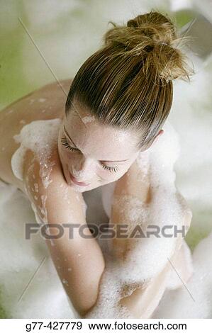 Stock Photo - Woman in bathtube.. Fotosearch