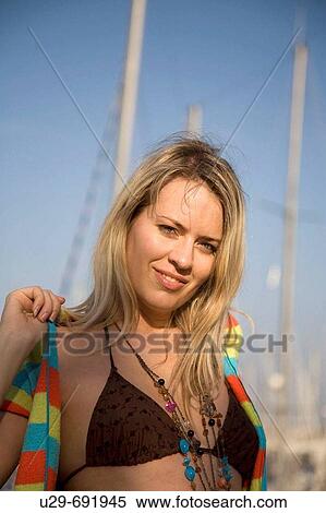 Stock Photography - Woman in beach wear. Fotosearch