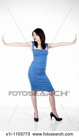 Woman in blue dress View Large Photo Image Stock Image - Woman in blue dress. Fotosearch