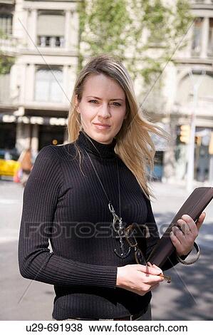 Stock Photo - Woman in business wear. Fotosearch