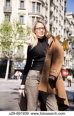 Stock Photo - Woman in business wear. Fotosearch