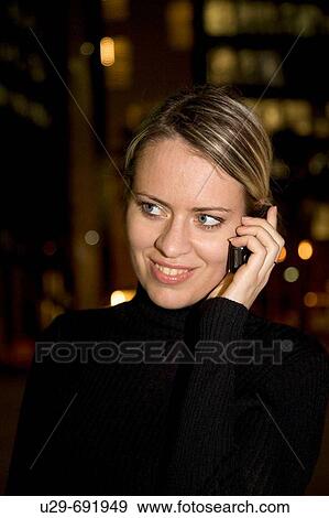 Stock Photo - Woman in business wear. Fotosearch