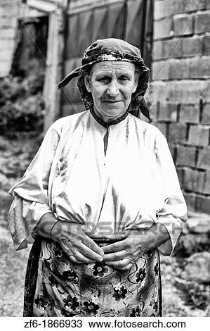 Woman in colorful clothes in Albania near Tirana View Large Photo Image Stock Image - Woman in colorful clothes in Albania near Tirana. Fotosearch