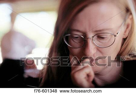 Woman in contemplative mood View Large Photo Image Stock Photo - Woman in contemplative mood. Fotosearch
