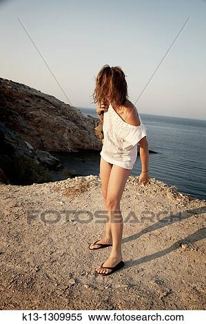 Woman in Folegandros island, The Cyclades, Greece View Large Photo Image Stock Photography - Woman in Folegandros island, The Cyclades, Greece. Fotosearch