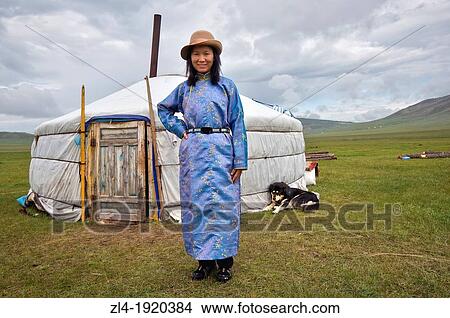 Woman in front of a yurt. Mongolia, Khovsgol, Zuun Nuur lake. Model Released. (/Julien Garcia) View Large Photo Image Picture - Woman in front of a yurt. Mongolia, Khovsgol, Zuun Nuur lake. Model Released. (/Julien Garcia). Fotosearch