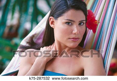 Stock Image - Woman in hammock. Fotosearch