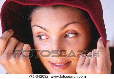 Woman in her hoodie View Large Photo Image Stock Image - Woman in her hoodie. Fotosearch