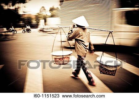 Woman in Ho Chi Minh, Vietnam View Large Photo Image Stock Image - Woman in Ho Chi Minh, Vietnam. Fotosearch