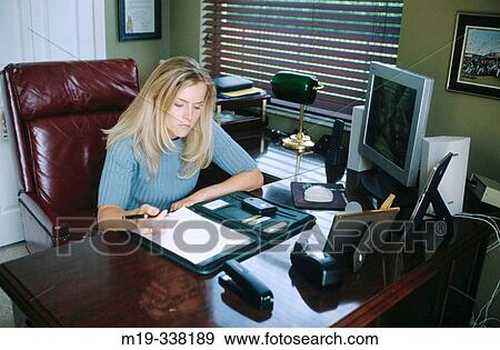 woman in home office View Large Photo Image Stock Photo - woman in home office. Fotosearch