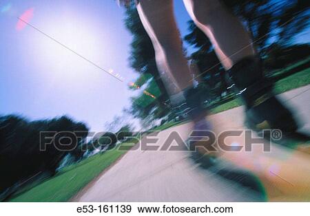 Stock Photo - Woman in-line skating, California, USA. Fotosearch
