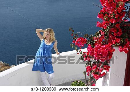 Woman in Oia, Santorini, Cyclades Islands, Greece View Large Photo Image Stock Photo - Woman in Oia, Santorini, Cyclades Islands, Greece. Fotosearch