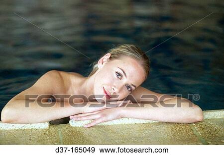 Woman in pool View Large Photo Image Stock Photo - Woman in pool. Fotosearch