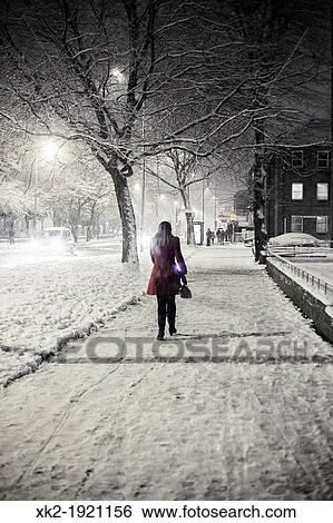 woman in red coat during cold wave, London, UK View Large Photo Image Stock Photograph - woman in red coat during cold wave, London, UK. Fotosearch