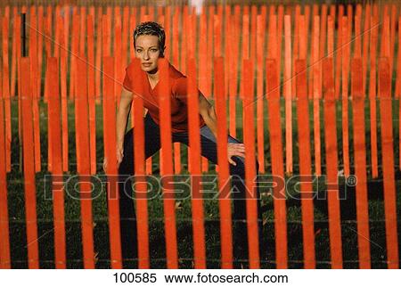 Woman in red View Large Photo Image Stock Photography - Woman in red. Fotosearch