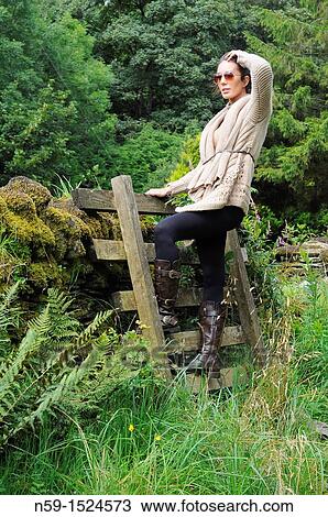 Woman in rural setting View Large Photo Image Stock Image - Woman in rural setting. Fotosearch