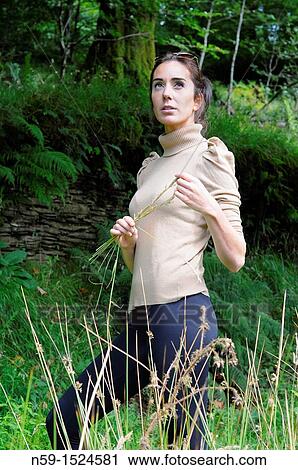 Woman in rural setting View Large Photo Image Stock Image - Woman in rural setting. Fotosearch