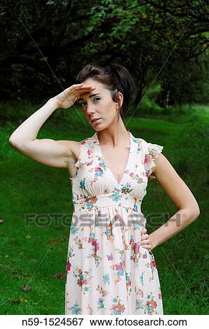 Woman in rural setting View Large Photo Image Stock Photo - Woman in rural setting. Fotosearch