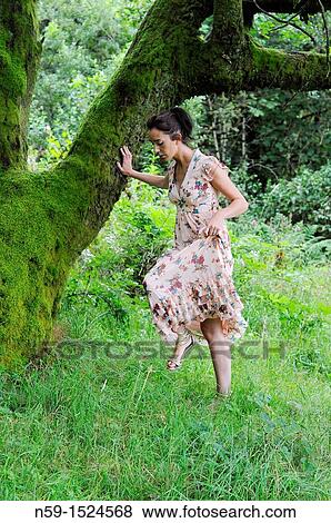 Woman in rural setting View Large Photo Image Stock Photo - Woman in rural setting. Fotosearch