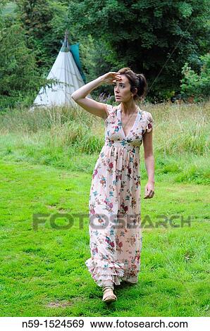 Woman in rural setting View Large Photo Image Stock Photo - Woman in rural setting. Fotosearch