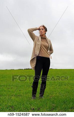 Woman in rural setting View Large Photo Image Stock Photo - Woman in rural setting. Fotosearch