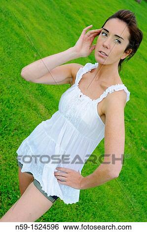 Woman in rural setting View Large Photo Image Stock Photograph - Woman in rural setting. Fotosearch