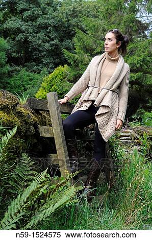 Woman in rural setting View Large Photo Image Stock Photography - Woman in rural setting. Fotosearch