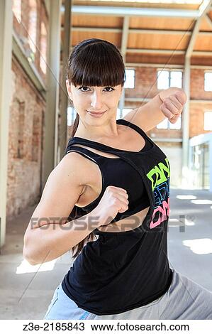 woman in sport dress dancing zumba or aerobics. View Large Photo Image Stock Image - woman in sport dress dancing zumba or aerobics.. Fotosearch