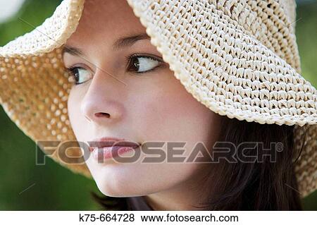 Woman in straw hat. View Large Photo Image Stock Photo - Woman in straw hat.. Fotosearch