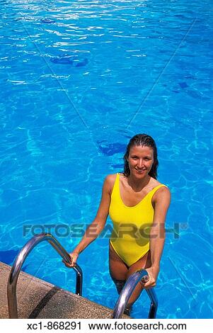 Woman in swimming pool, Punta Cana, Dominican Republic, Caribbean View Large Photo Image Stock Image - Woman in swimming pool, Punta Cana, Dominican Republic, Caribbean. Fotosearch