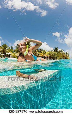 Woman in Swimming Pool, South Male Atoll, Maldives View Large Photo Image Stock Image - Woman in Swimming Pool, South Male Atoll, Maldives. Fotosearch