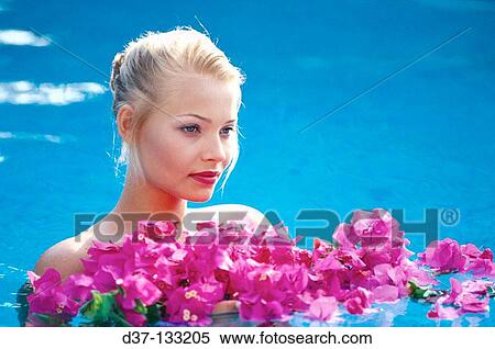 Stock Photography - Woman in swimming pool. Fotosearch