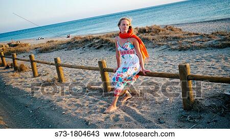 Stock Image - Woman in the beach in Cabo de Gata, Almer? a, Andalusia, Spain. Fotosearch