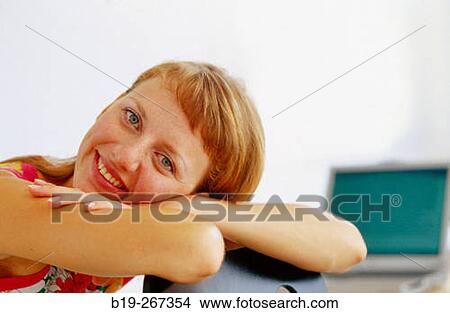 Picture - Woman in the office. Fotosearch