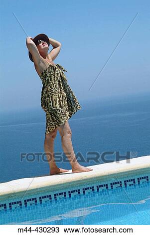 Woman in the swimming-pool. Javea. Alicante. Spain. View Large Photo Image Stock Image - Woman in the swimming-pool. Javea. Alicante. Spain.. Fotosearch