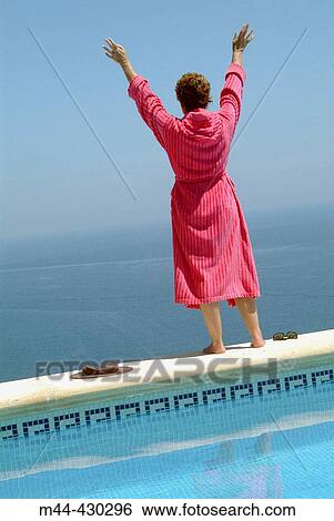 Woman in the swimming-pool. Javea. Alicante. Spain. View Large Photo Image Stock Photograph - Woman in the swimming-pool. Javea. Alicante. Spain.. Fotosearch