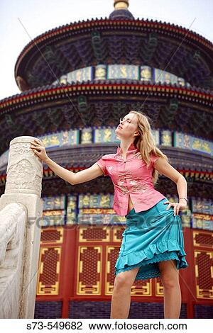 Stock Image - Woman in the Temple of Heaven. Beijing. China.. Fotosearch