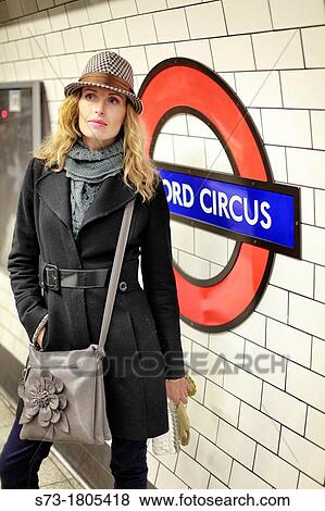Woman in the underground in London, England View Large Photo Image Stock Photo - Woman in the underground in London, England. Fotosearch