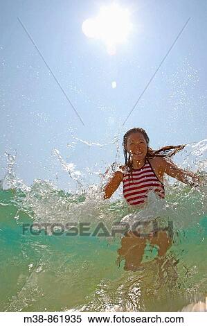 Woman in the water Maui, Hawaii View Large Photo Image Stock Photography - Woman in the water Maui, Hawaii. Fotosearch