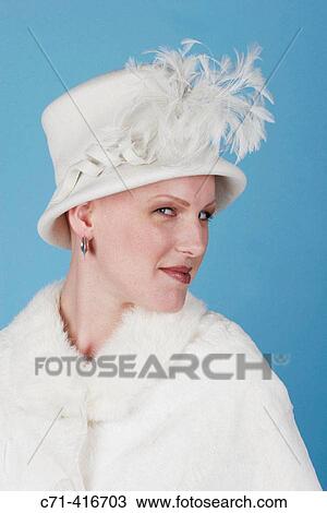 Woman in white hat View Large Photo Image Stock Image - Woman in white hat. Fotosearch