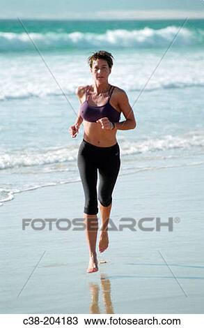 Stock Image - Woman jogging. Fotosearch