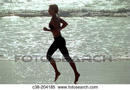 Woman jogging View Large Photo Image Stock Photography - Woman jogging. Fotosearch