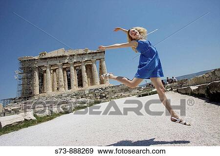 Woman jump in front the Parthenon, Acropolis, Athens, Greece View Large Photo Image Stock Photo - Woman jump in front the Parthenon, Acropolis, Athens, Greece. Fotosearch