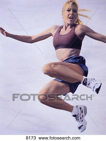 Woman jumping View Large Photo Image Stock Image - Woman jumping. Fotosearch