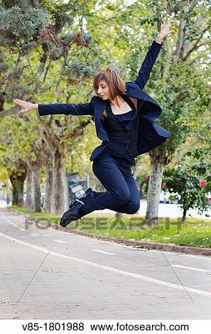 woman jumping. View Large Photo Image Stock Photo - woman jumping.. Fotosearch