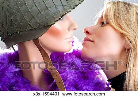 Woman kissing a mannequin View Large Photo Image Stock Image - Woman kissing a mannequin. Fotosearch