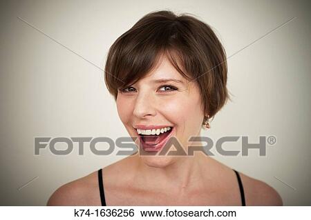 Stock Photograph - woman laughing. Fotosearch