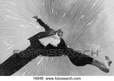 Stock Photograph - Woman leaps into air. Fotosearch