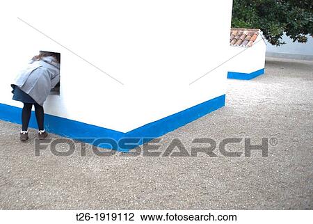 Stock Image - Woman look inside a performance in Serralves museum in Port city, Portugal. Fotosearch