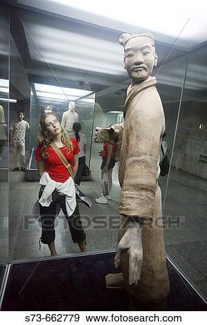Woman looking at terracotta warrior. Xian City. Shaanxi Province. China. View Large Photo Image Stock Photo - Woman looking at terracotta warrior. Xian City. Shaanxi Province. China.. Fotosearch